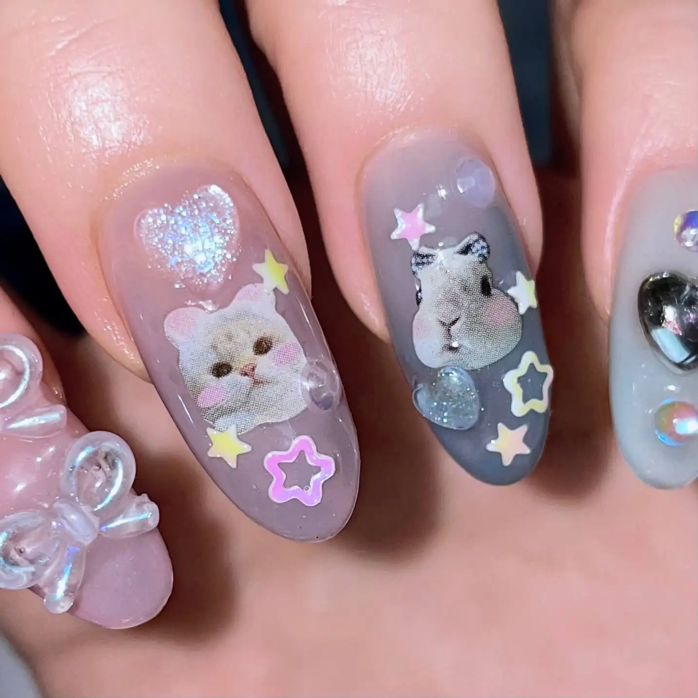 Soft set with encapsulated cat and hamster motifs, stars and a 3D bow