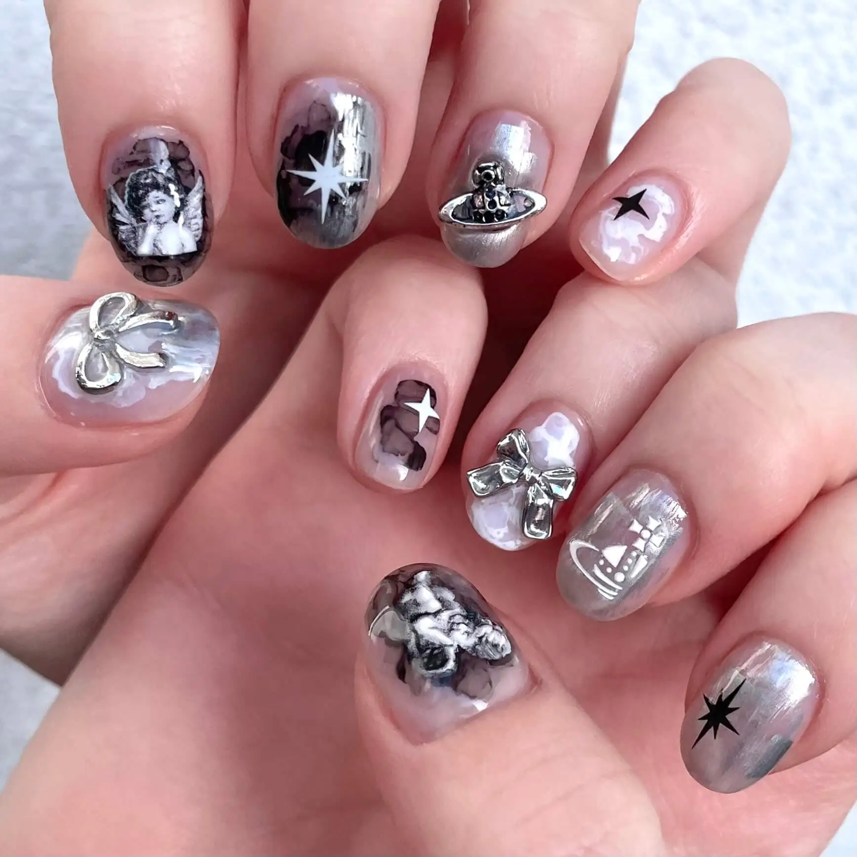 Silver chrome set with cherub prints, 3D bows and stars