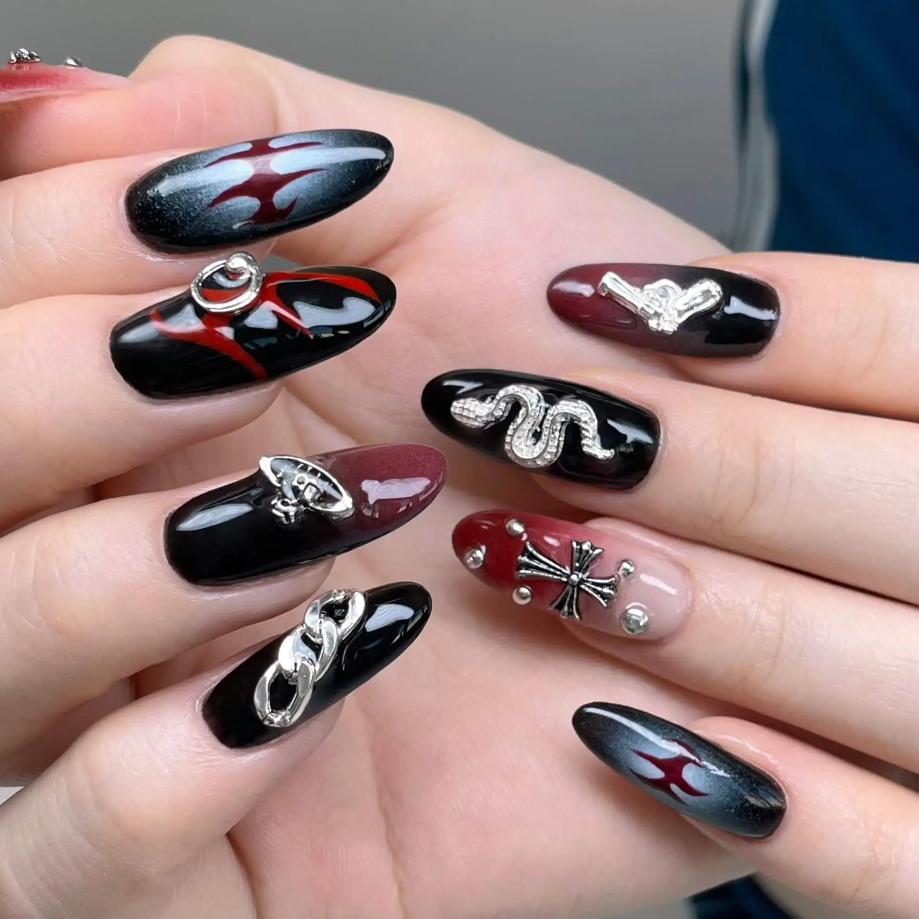 Black and red set with flames, snakes and chain charms